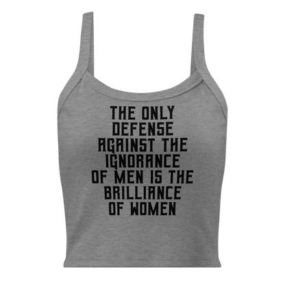 "The Only defense against the ignorance of men is the brilliance of women" printed on a athletic heather women's micro-rib tanktop laying on a flat surface
