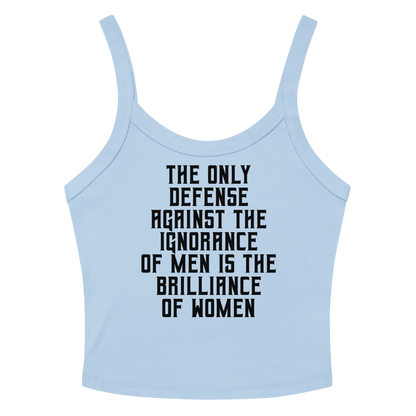 "The Only defense against the ignorance of men is the brilliance of women" printed on a solid baby blue blend women's micro-rib tanktop laying on a flat surface amongst sunglasses and shorts
