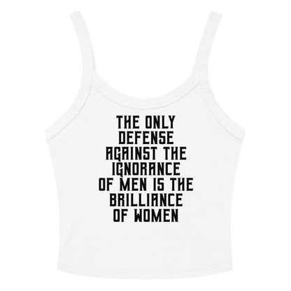 "The Only defense against the ignorance of men is the brilliance of women" printed on a solid white blend women's micro-rib tanktop laying on a flat surface amongst sunglasses and shorts