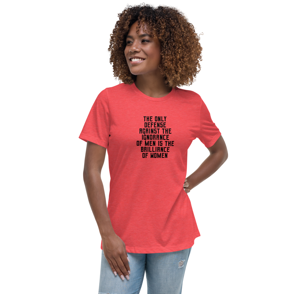 "The Only defense against the ignorance of men is the brilliance of women" printed on a heather red women's relaxed t-shirt worn by a female