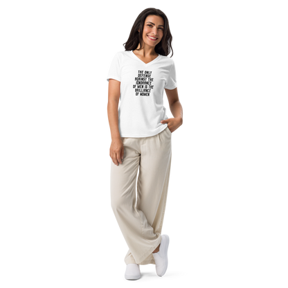 "The Only defense against the ignorance of men is the brilliance of women" printed on a solid white blend women's relaxed v-neck t-shirt worn by a female