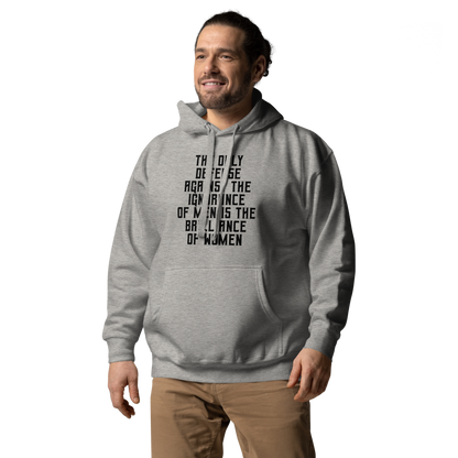 "The Only defense against the ignorance of men is the brilliance of women" printed on a carbon grey unisex hoodie worn by a male