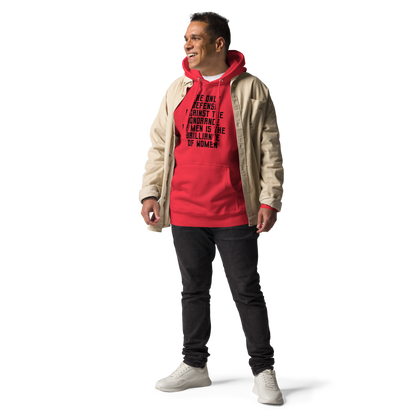 "The Only defense against the ignorance of men is the brilliance of women" printed on a team red unisex hoodie worn by a male with a jacket on top