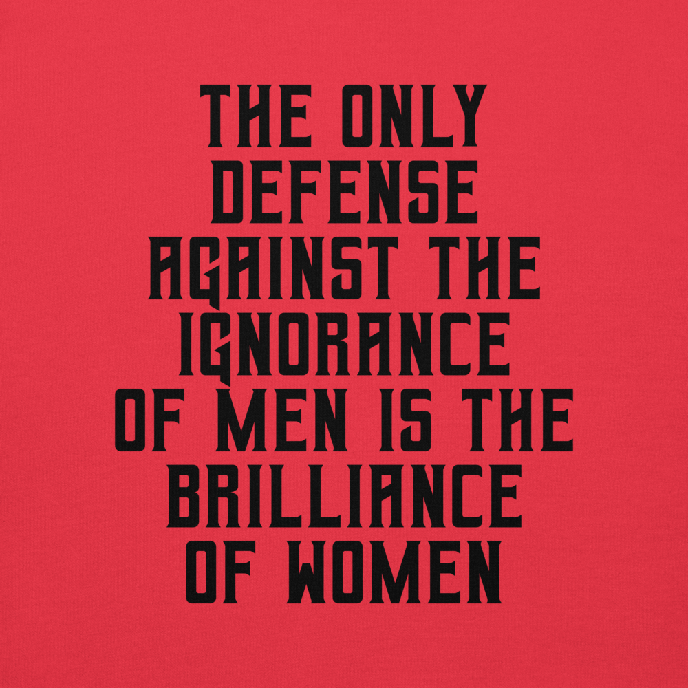 "The Only defense against the ignorance of men is the brilliance of women" printed on a team red background