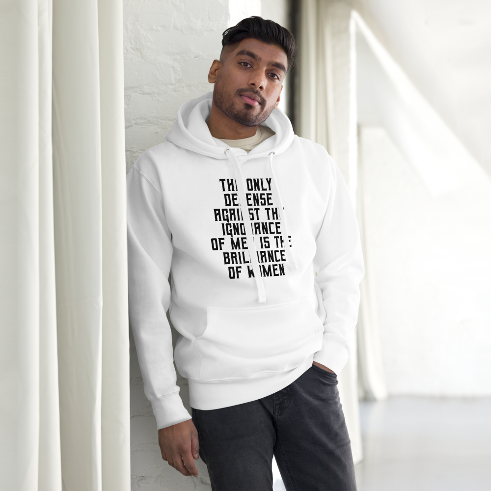 "The Only defense against the ignorance of men is the brilliance of women" printed on a white unisex hoodie worn by a male