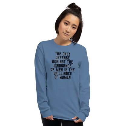 "The Only defense against the ignorance of men is the brilliance of women" printed on a indigo blue men's long sleeve shirt worn by a female