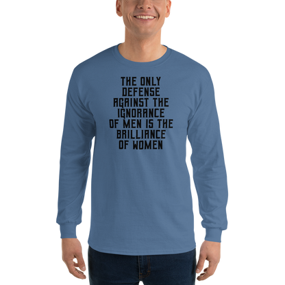 "The Only defense against the ignorance of men is the brilliance of women" printed on a indigo blue men's long sleeve shirt worn by a male