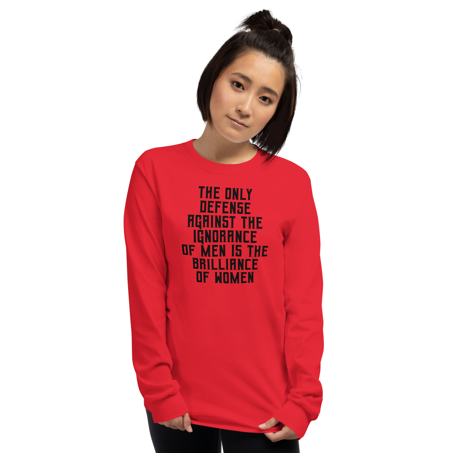 "The Only defense against the ignorance of men is the brilliance of women" printed on a red men's long sleeve shirt worn by a female