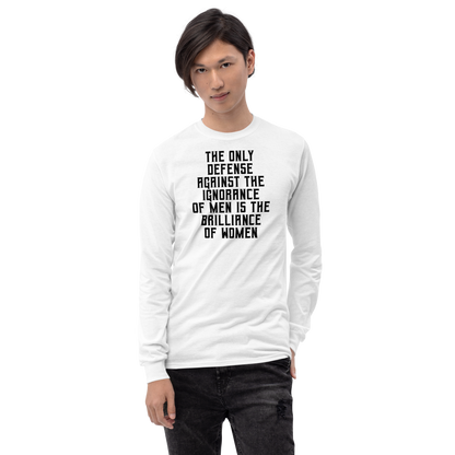 "The Only defense against the ignorance of men is the brilliance of women" printed on a white men's long sleeve shirt worn by a male
