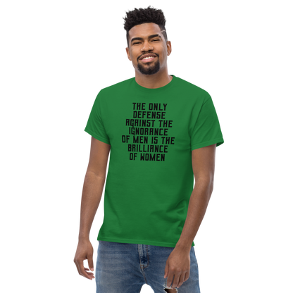 "The Only defense against the ignorance of men is the brilliance of women" printed on a turf green unisex classic tee worn by a male
