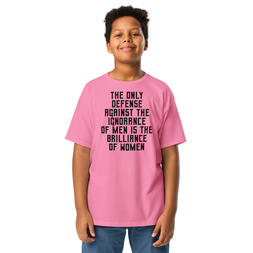 "The Only defense against the ignorance of men is the brilliance of women" printed on a azalea youth classic tee worn by a male