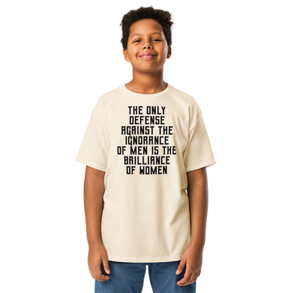 "The Only defense against the ignorance of men is the brilliance of women" printed on a natural youth classic tee worn by a male