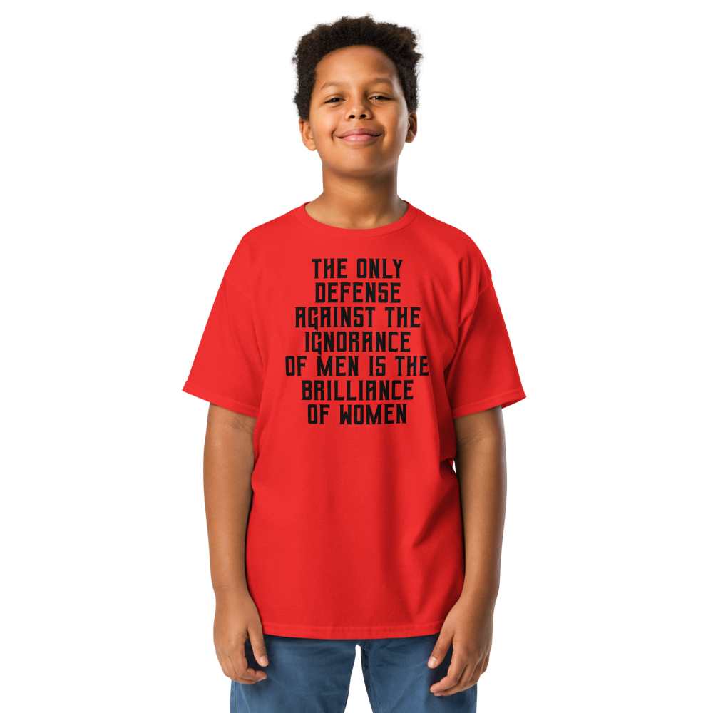"The Only defense against the ignorance of men is the brilliance of women" printed on a red youth classic tee worn by a male