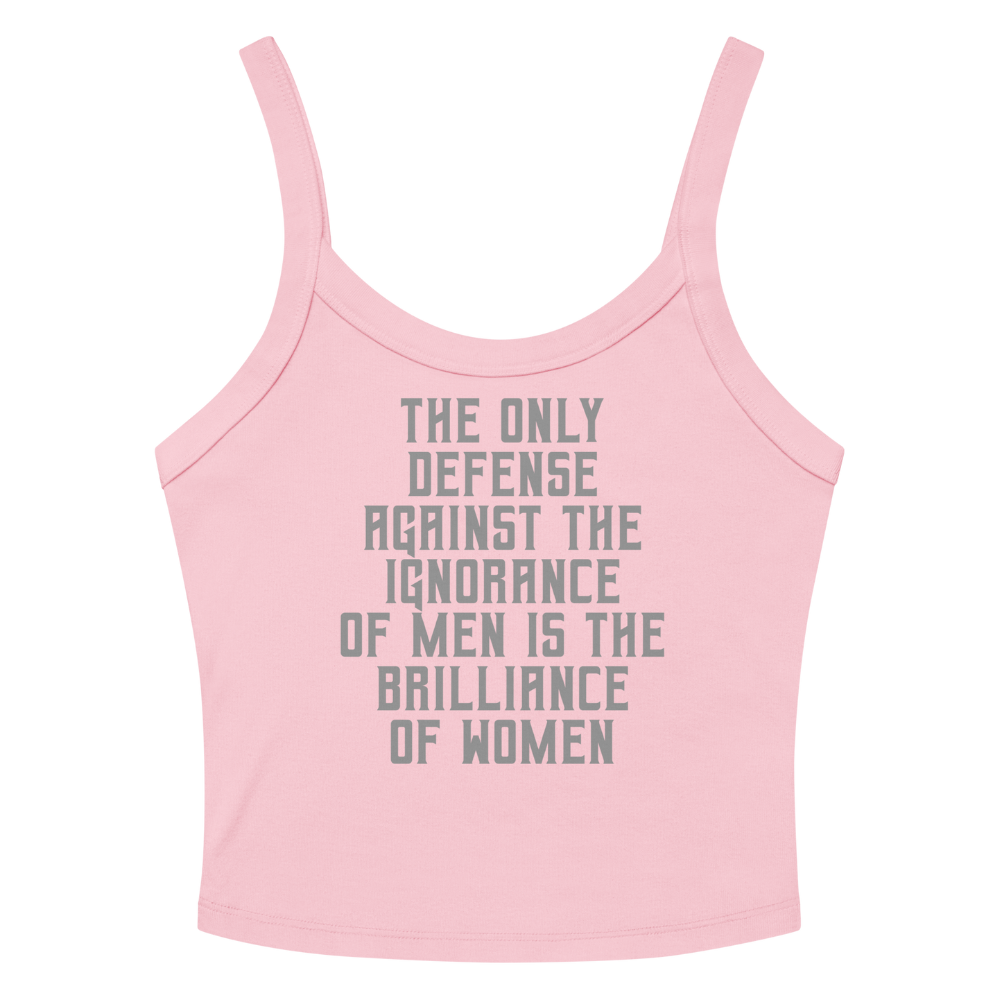"The Only defense against the ignorance of men is the brilliance of women" printed on a solid pink blend women's micro-rib tanktop laying on a flat surface amongst sunglasses and shorts