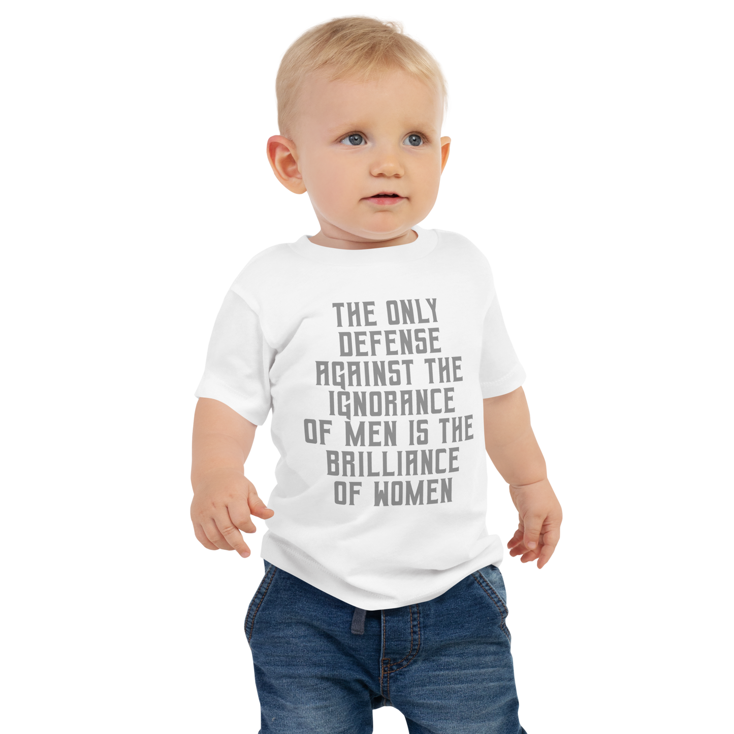 "The Only defense against the ignorance of men is the brilliance of women" printed on a white baby jersey short sleeve tee worn by a male
