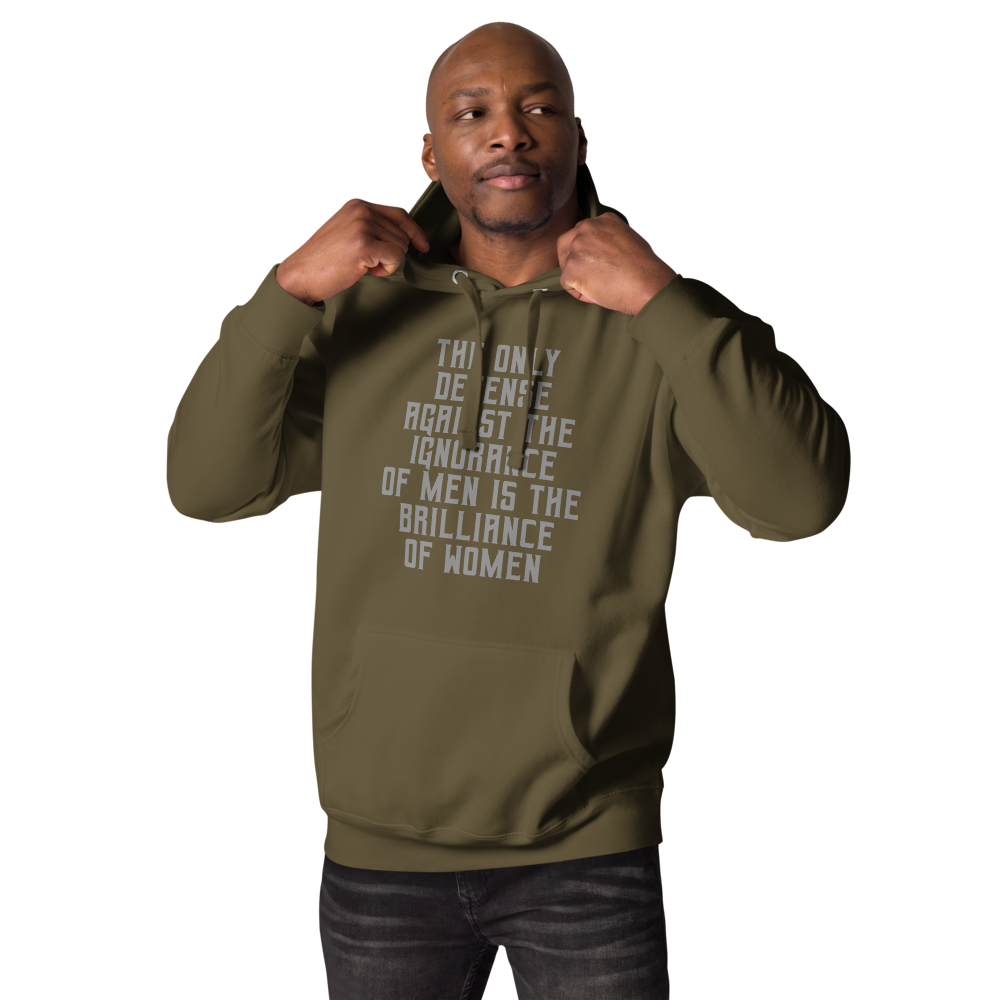 "The Only defense against the ignorance of men is the brilliance of women" printed on a military green unisex hoodie worn by a male