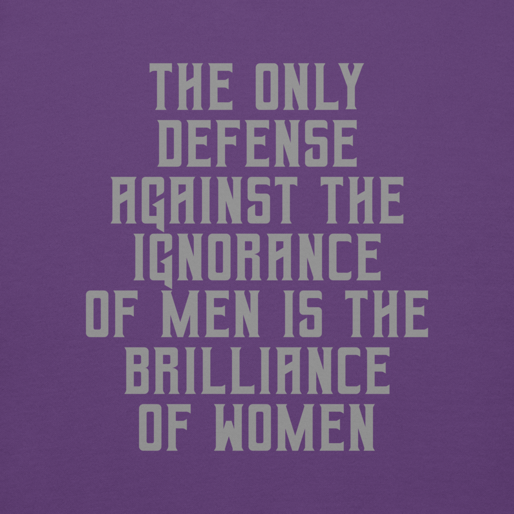 "The Only defense against the ignorance of men is the brilliance of women" printed on a purple background