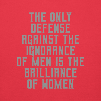 "The Only defense against the ignorance of men is the brilliance of women" printed on a team red background