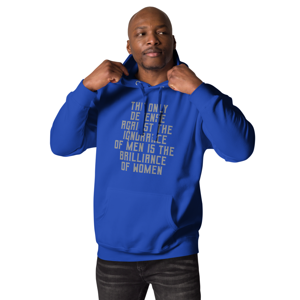 "The Only defense against the ignorance of men is the brilliance of women" printed on a team royal unisex hoodie worn by a male