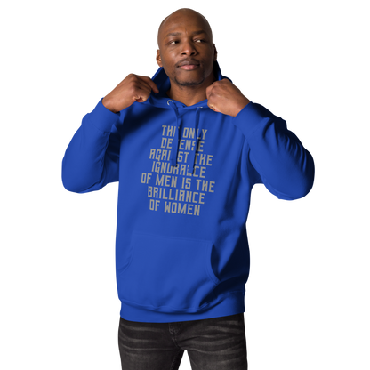 "The Only defense against the ignorance of men is the brilliance of women" printed on a team royal unisex hoodie worn by a male