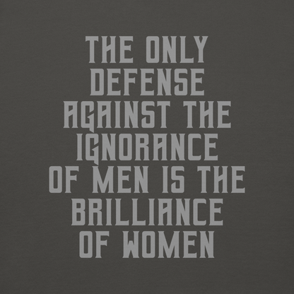 "The Only defense against the ignorance of men is the brilliance of women" printed on a vintage black background