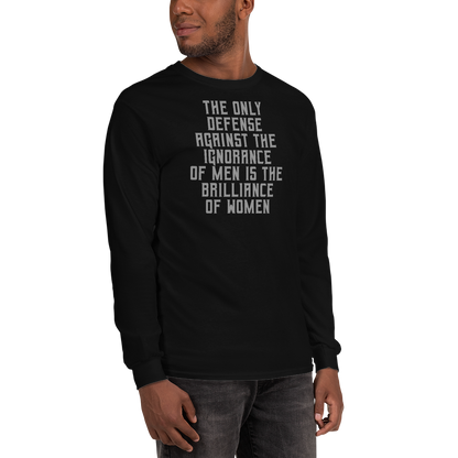 "The Only defense against the ignorance of men is the brilliance of women" printed on a black men's long sleeve shirt worn by a male