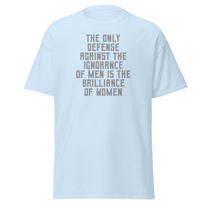 "The Only defense against the ignorance of men is the brilliance of women" printed on a light blue on an invisible body