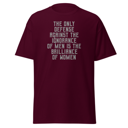 "The Only defense against the ignorance of men is the brilliance of women" printed on a maroon on an invisible body