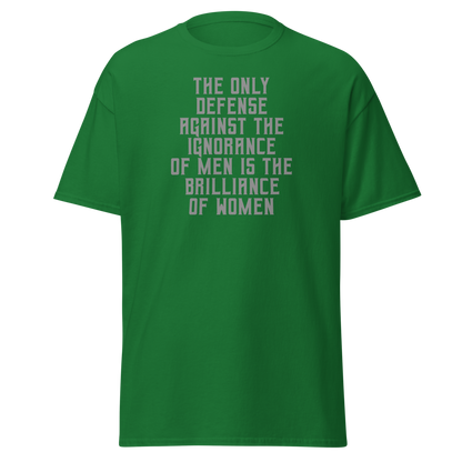 "The Only defense against the ignorance of men is the brilliance of women" printed on a turf green on an invisible body