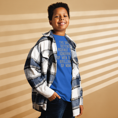 "The Only defense against the ignorance of men is the brilliance of women" printed on a royal youth classic tee worn by a male also wearing a jacket