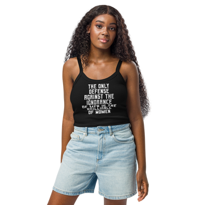 "The Only defense against the ignorance of men is the brilliance of women" printed on a solid black blend women's micro-rib tanktop worn by a female