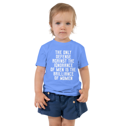 "The Only defense against the ignorance of men is the brilliance of women" printed on a heather columbia blue toddler short sleeve tee worn by a female