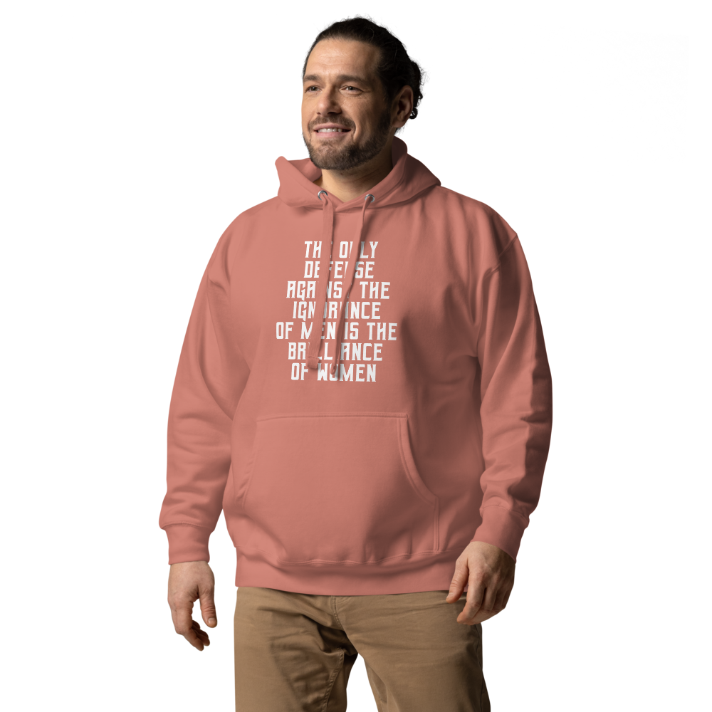 "The Only defense against the ignorance of men is the brilliance of women" printed on a dusty rose unisex hoodie worn by a male