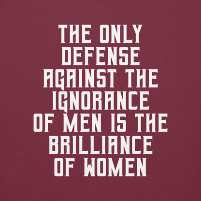 "The Only defense against the ignorance of men is the brilliance of women" printed on a maroon background