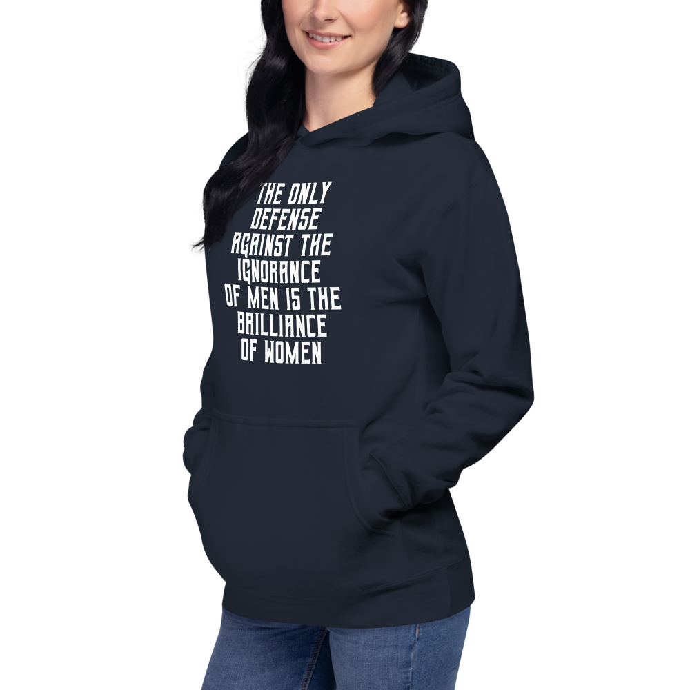 "The Only defense against the ignorance of men is the brilliance of women" printed on a navy blazer unisex hoodie worn by a female