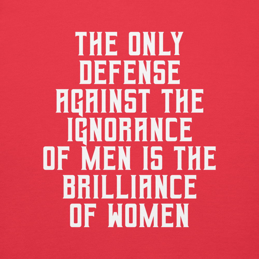 "The Only defense against the ignorance of men is the brilliance of women" printed on a team red background