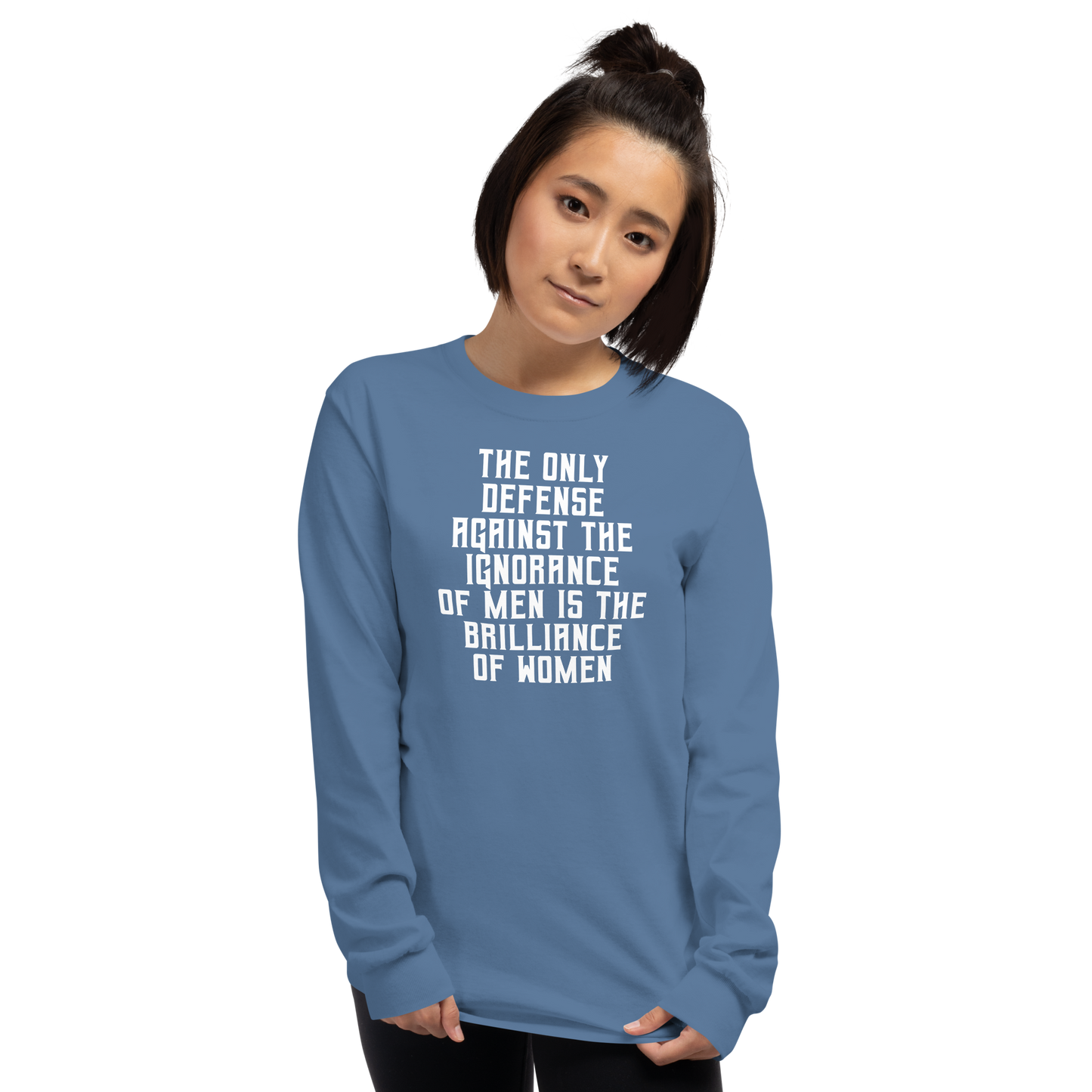 "The Only defense against the ignorance of men is the brilliance of women" printed on a indigo blue men's long sleeve shirt worn by a female