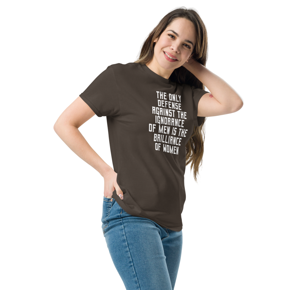 "The Only defense against the ignorance of men is the brilliance of women" printed on a dark chocolate unisex classic tee worn by a female
