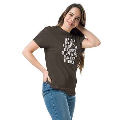 "The Only defense against the ignorance of men is the brilliance of women" printed on a dark chocolate unisex classic tee worn by a female