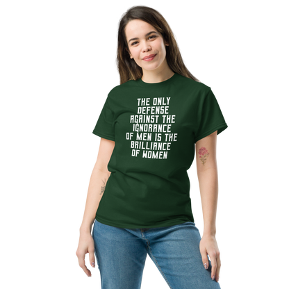 "The Only defense against the ignorance of men is the brilliance of women" printed on a forest green unisex classic tee worn by a female