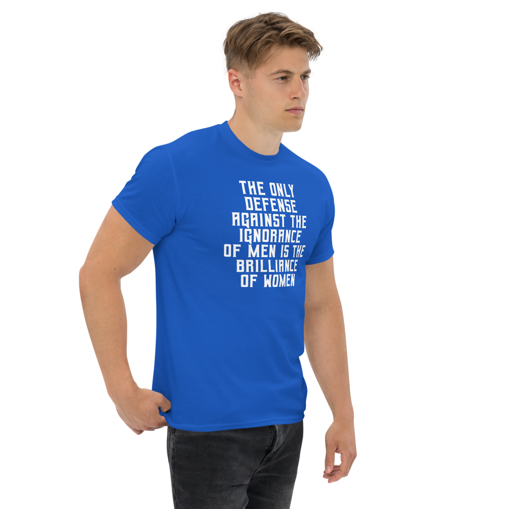 "The Only defense against the ignorance of men is the brilliance of women" printed on a royal unisex classic tee worn by a male