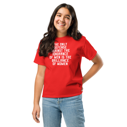 "The Only defense against the ignorance of men is the brilliance of women" printed on a red youth classic tee worn by a female
