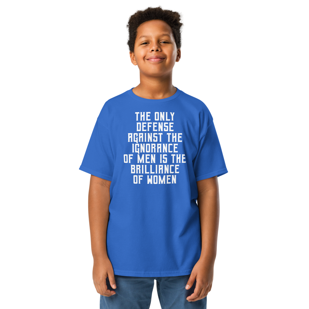 "The Only defense against the ignorance of men is the brilliance of women" printed on a royal youth classic tee worn by a male