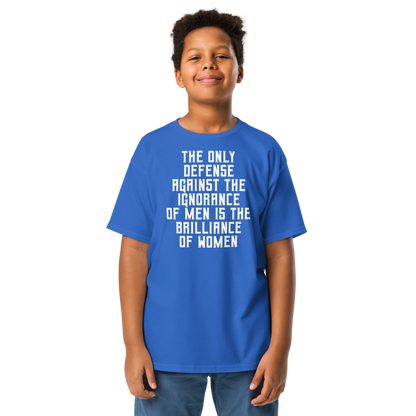 "The Only defense against the ignorance of men is the brilliance of women" printed on a royal youth classic tee worn by a male