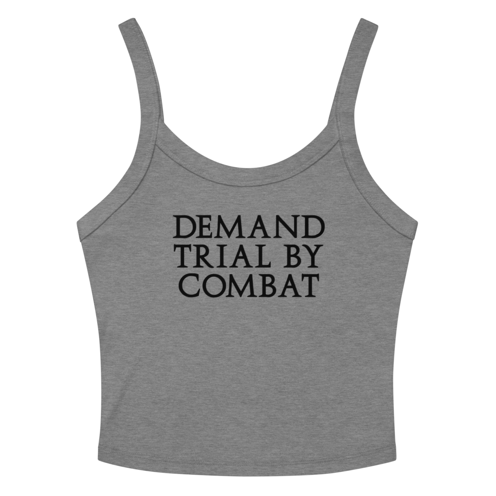 "Demand trial by combat" printed on a athletic heather women's micro-rib tanktop laying on a flat surface amongst sunglasses and shorts