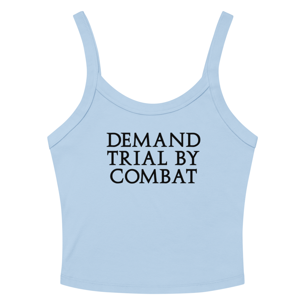 "Demand trial by combat" printed on a solid baby blue blend women's micro-rib tanktop laying on a flat surface amongst sunglasses and shorts