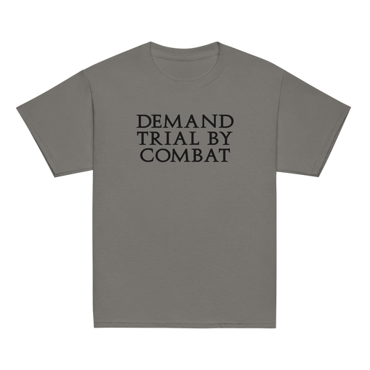 "Demand trial by combat" printed on a charcoal youth classic tee laying on a flat surface