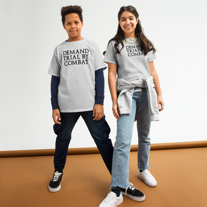 "Demand trial by combat" printed on a sport grey youth classic tee worn by a female and male