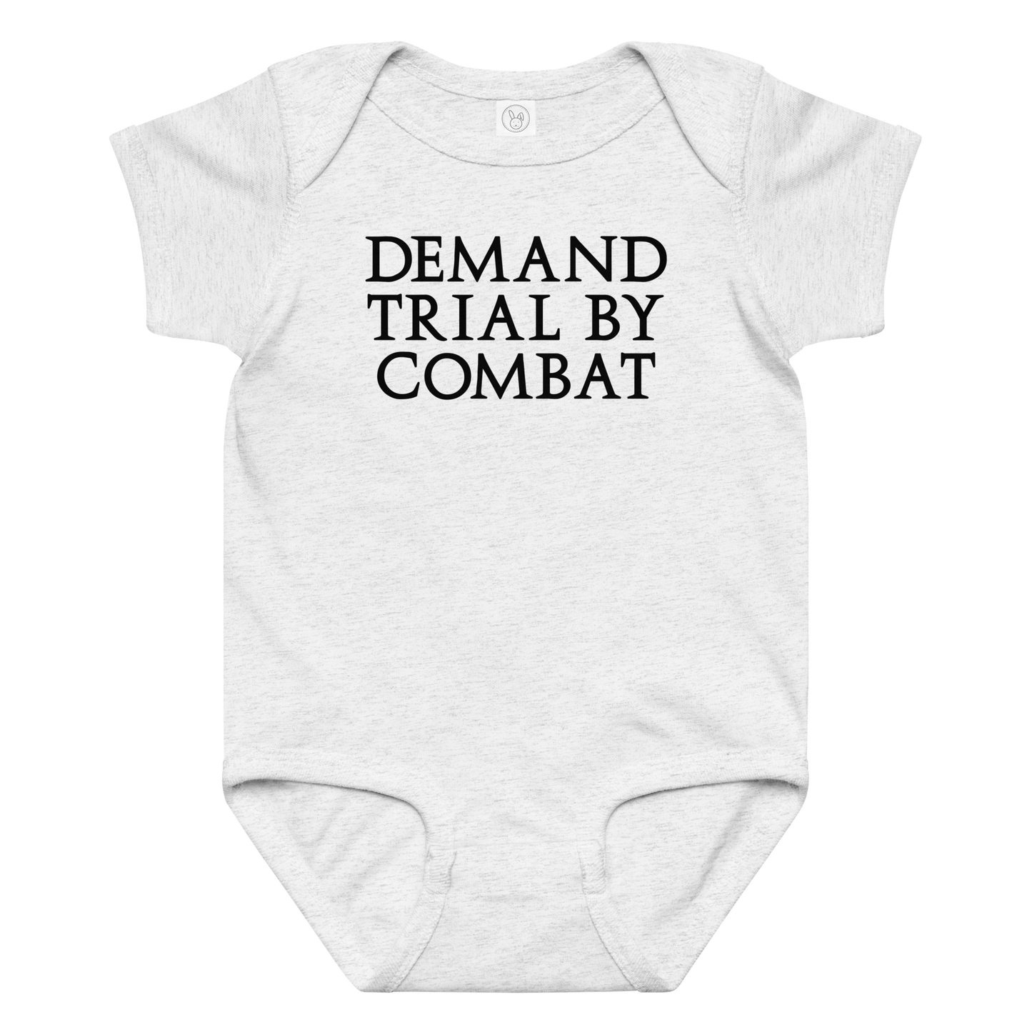 "Demand trial by combat" printed on a ash baby jersey bodysuit laying on a flat surface amongst other clothes
