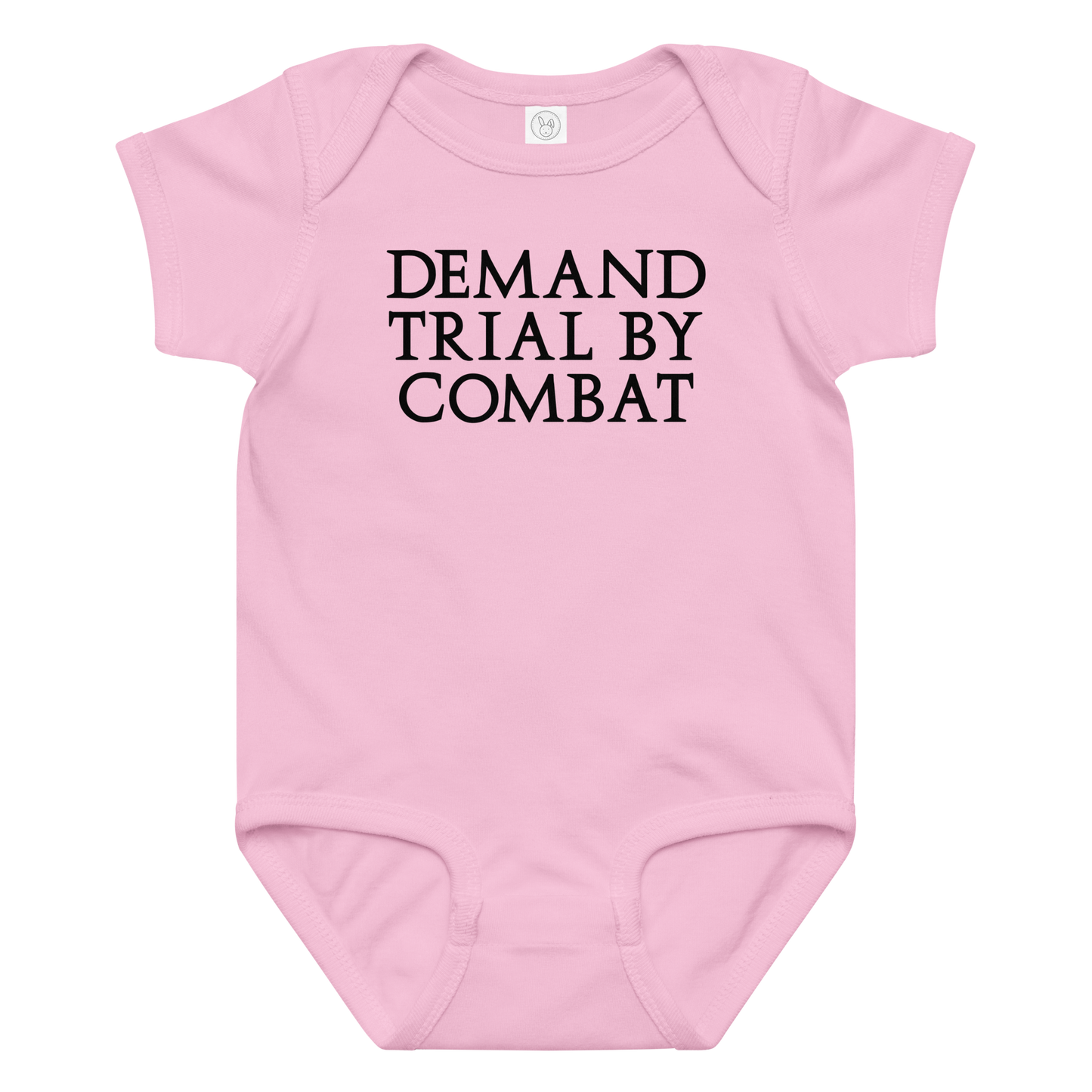 "Demand trial by combat" printed on a pink baby jersey bodysuit laying on a flat surface amongst other clothes